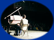 Boy playing piano solo